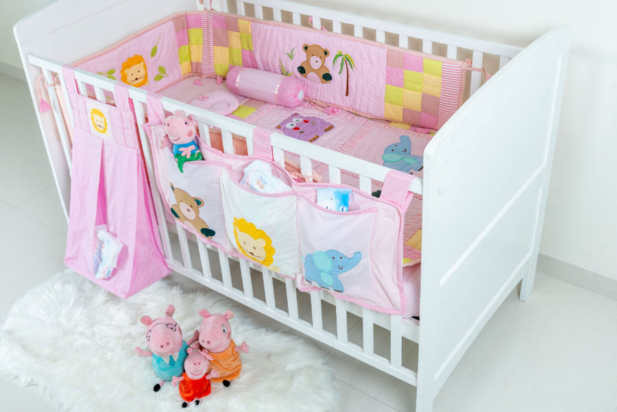 Pink Jungle Friends - 9 pc Bedding Set - Comforter| Cot Bumper |Cot Sheet | Baby Pillow | 2 Bolsters | Diaper Stacker | 3-Pocket Cot Organizer | Toiletry Kit